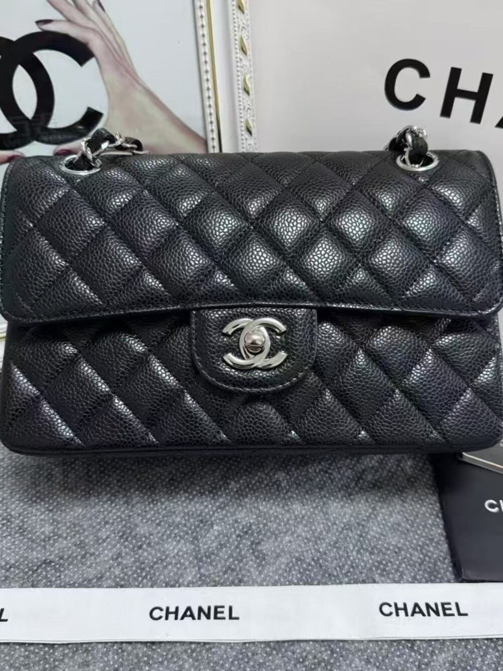 CHANEL Classic Flap Bag in Black Caviar Leather